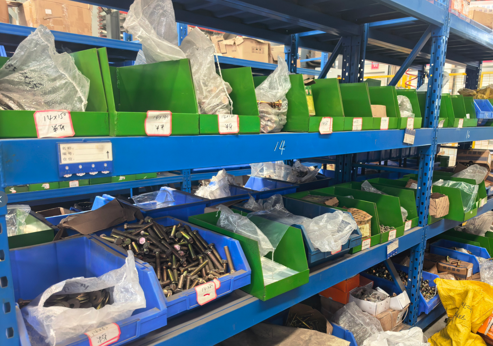 Classified truck body parts on storage racks in the CORLIR warehouse